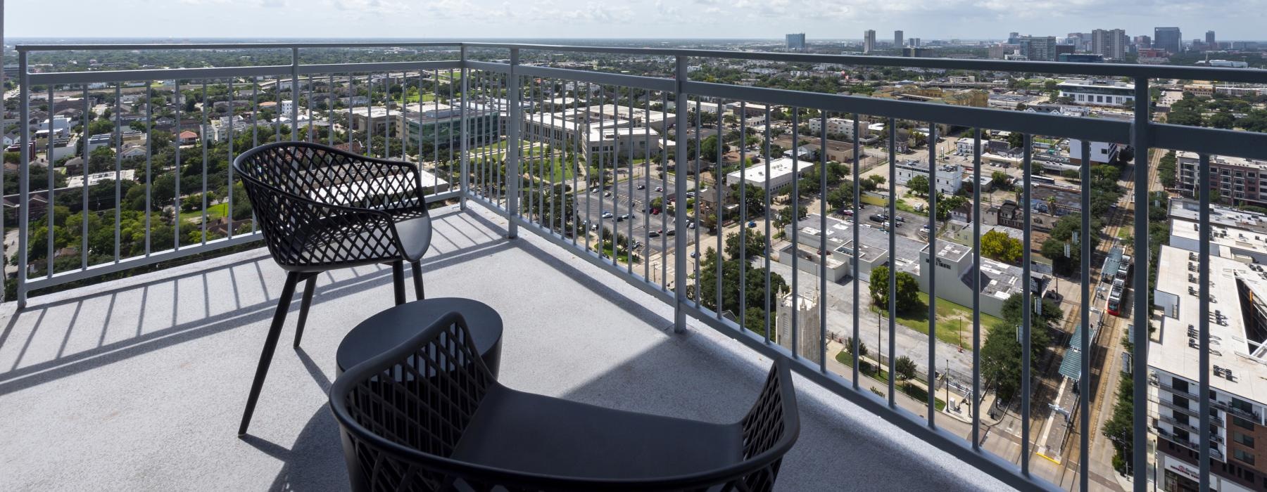 a view of a city from a balcony