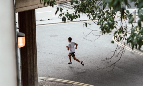 a man running on a street